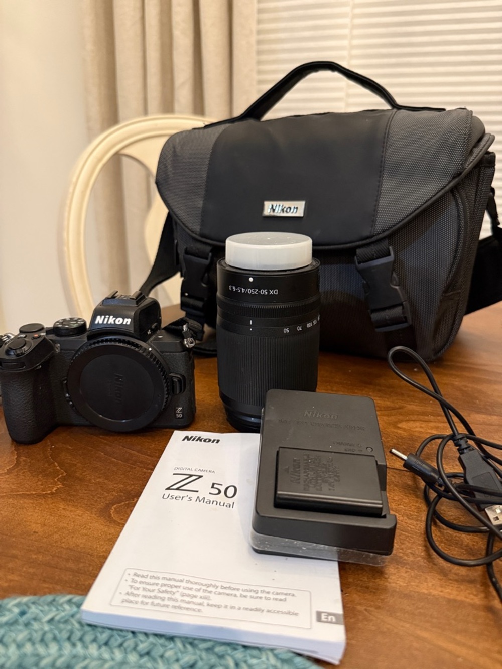 Nikon Z50 Mirrorless Camera with Telephoto Zoom Lens. Lg padded case.